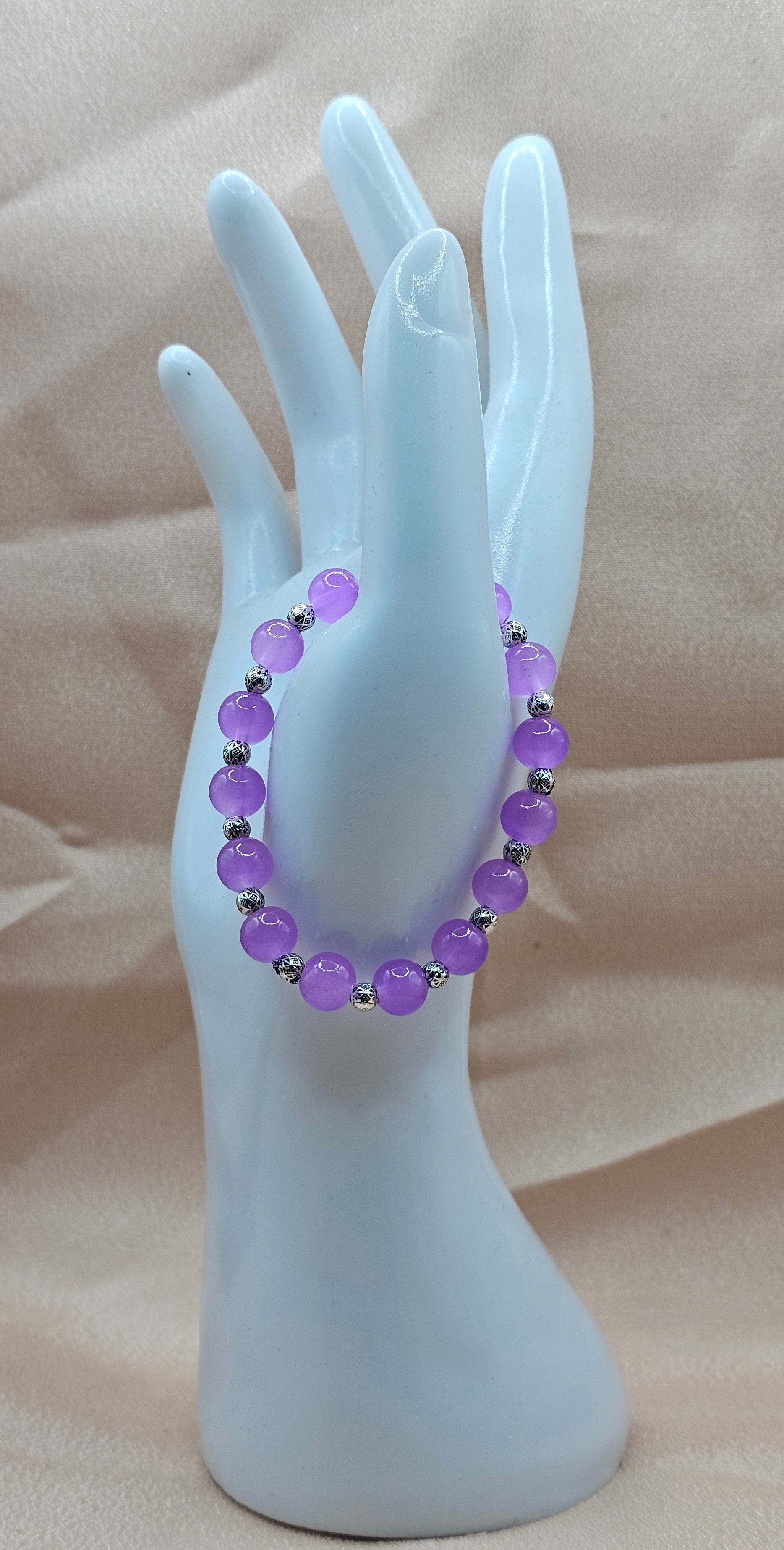 Handmade lavender amethyst purple beaded stretch bracelet with silver spacers, witchy jewellery Australia