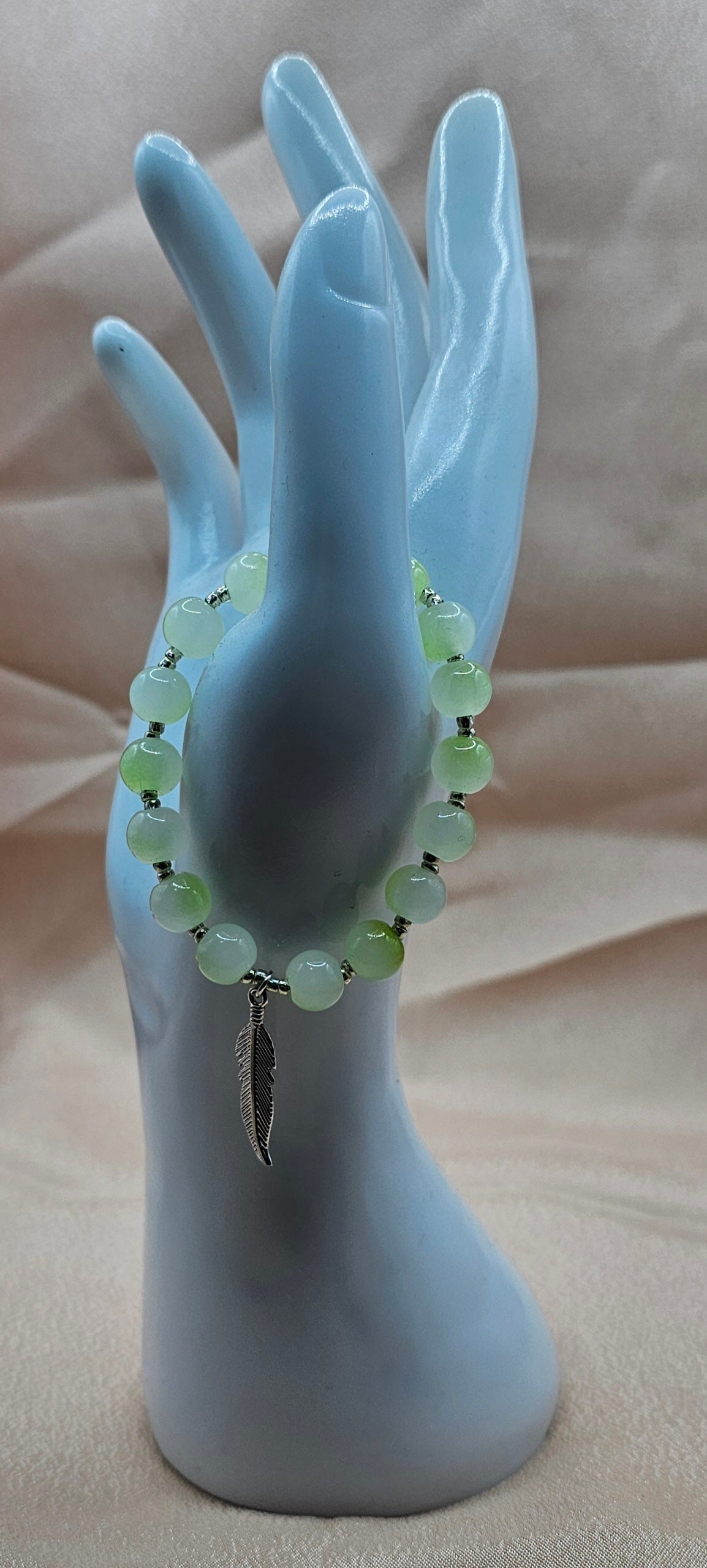Handmade green marbled beaded bracelet with silver feather charm, cottagecore boho jewellery Australia