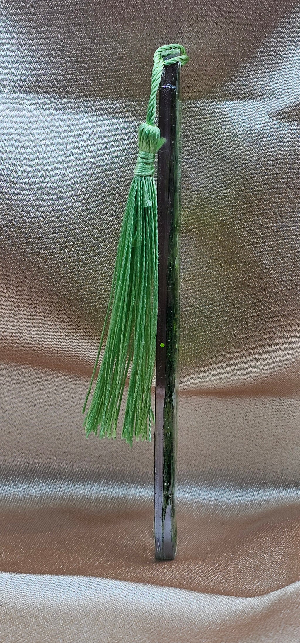 Handmade enchanted forest resin bookmark with real pressed ferns, holographic glitter & sage tassel. Cottagecore & fairycore book accessory handmade in Australia.