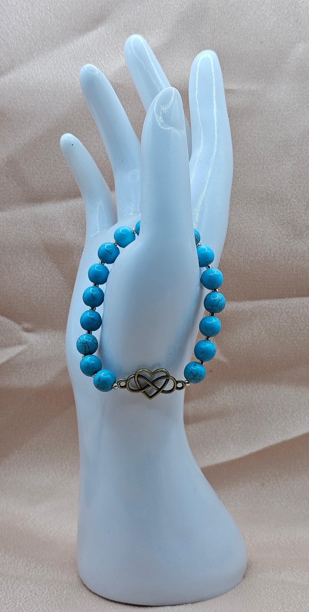 Turquoise beaded bracelet with Infinity Charm
