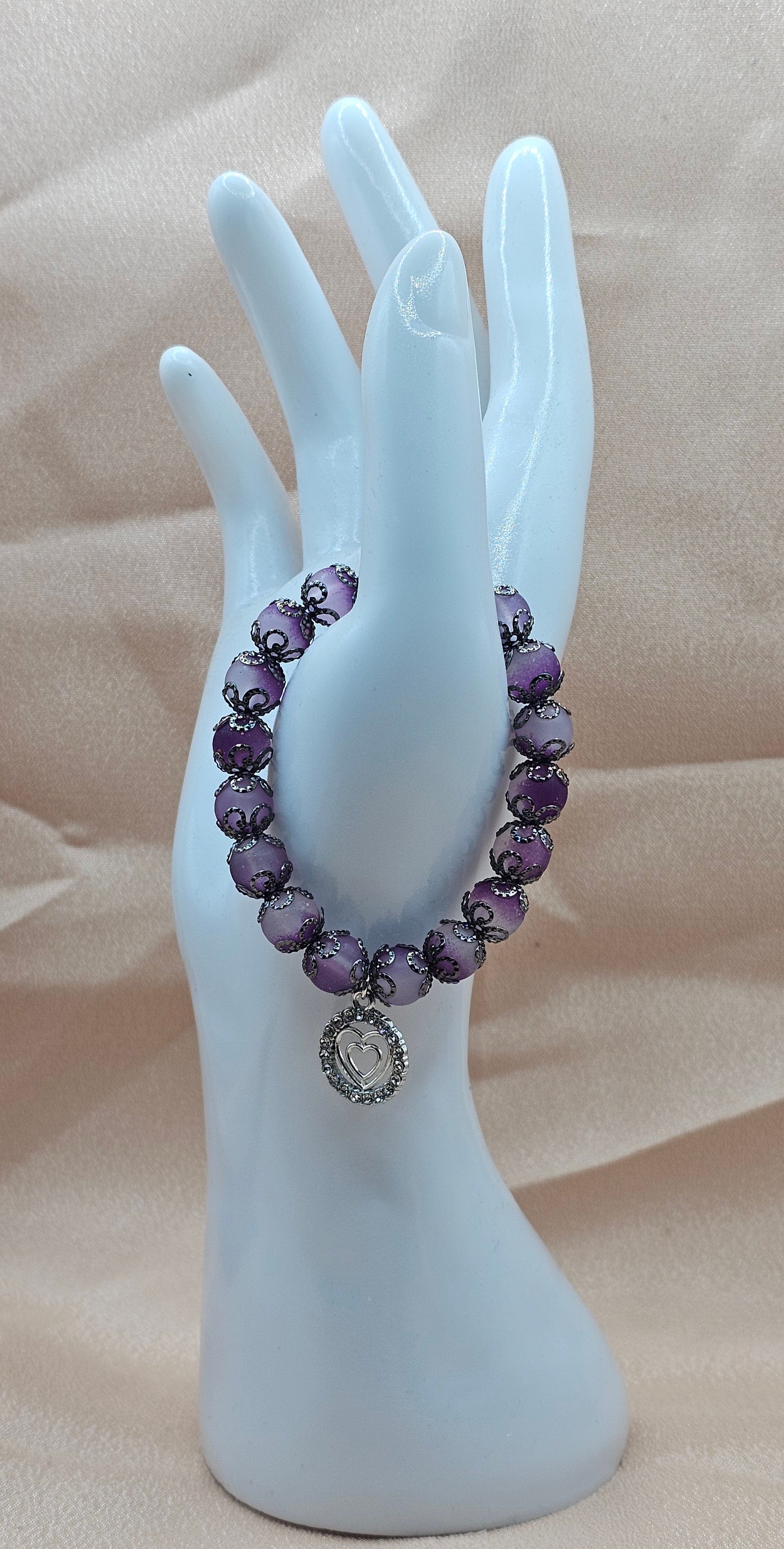 Handmade purple crackle bead bracelet with double heart rhinestone charm and black filigree, soft goth jewellery Australia