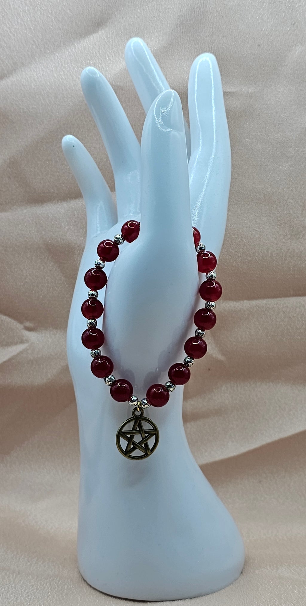 Handmade carnelian pentagram bracelet with red beaded stretch and bronze pentacle, witchy jewellery Australia
