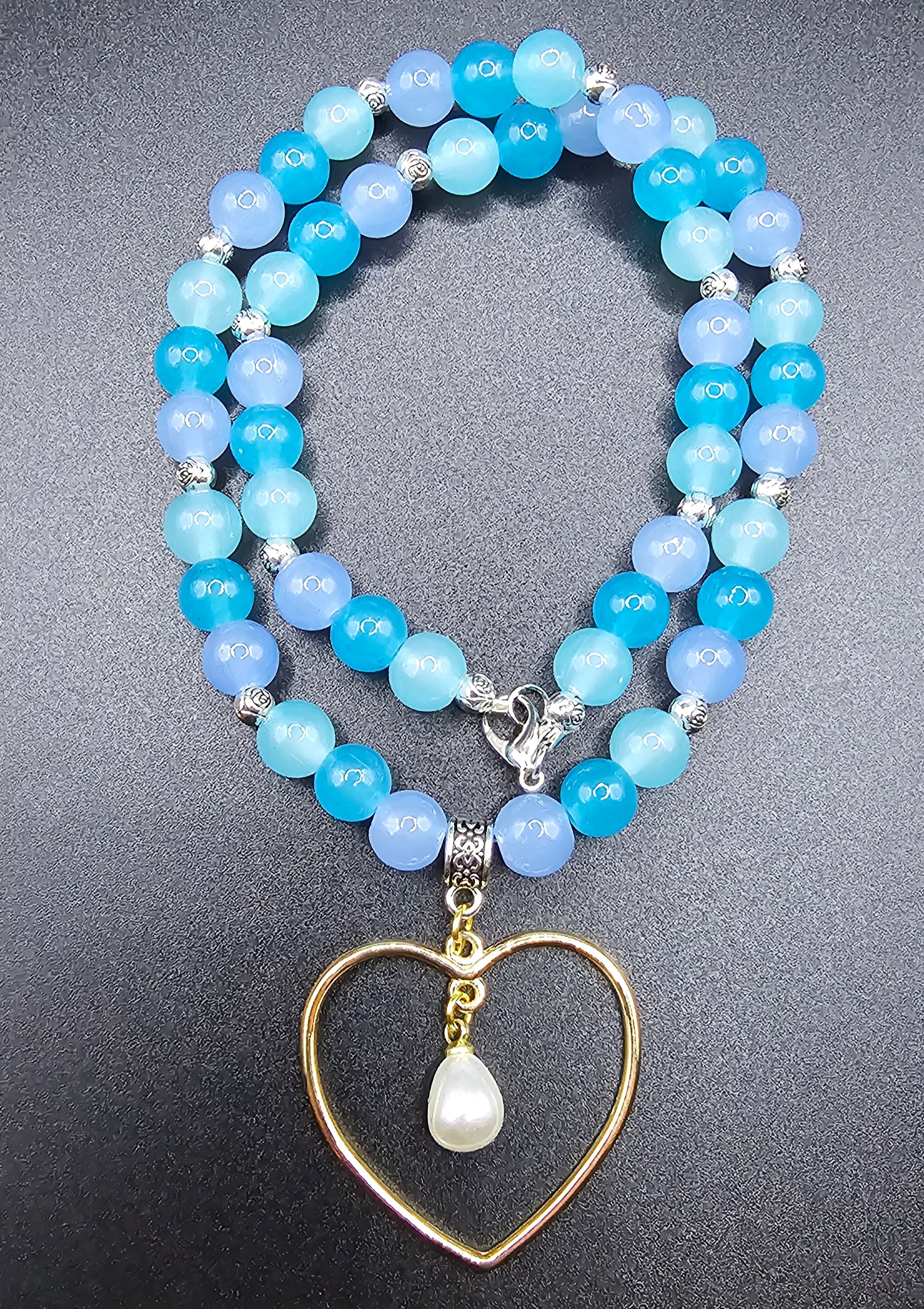 Handmade blue beaded angelcore necklace with gold heart and pearl pendant, jewellery Australia